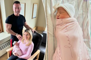 Mike the Situation and wife with their third child