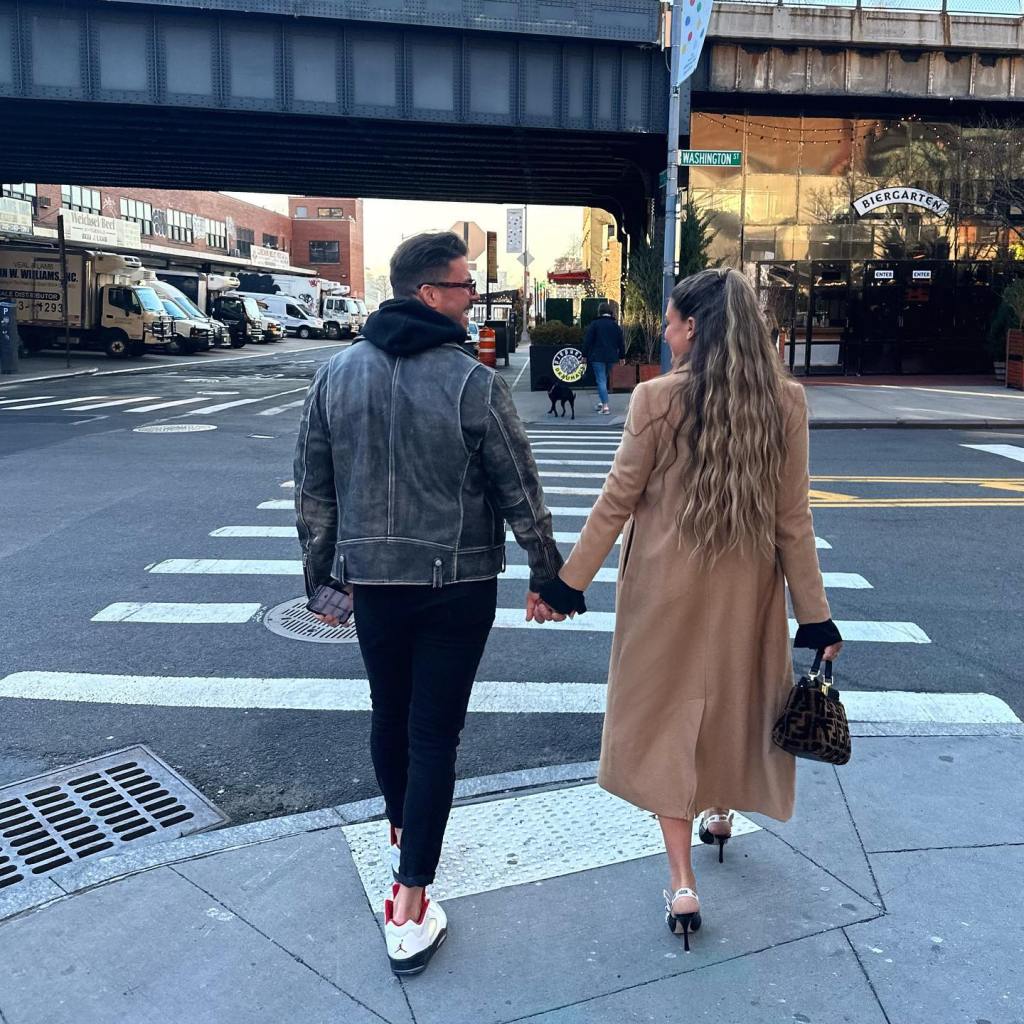 Jax Taylor and Brittany Cartwright holding hands