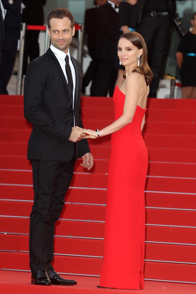 Natalie Portman and Benjamin Millepied holding hands at Cannes Film Festival.