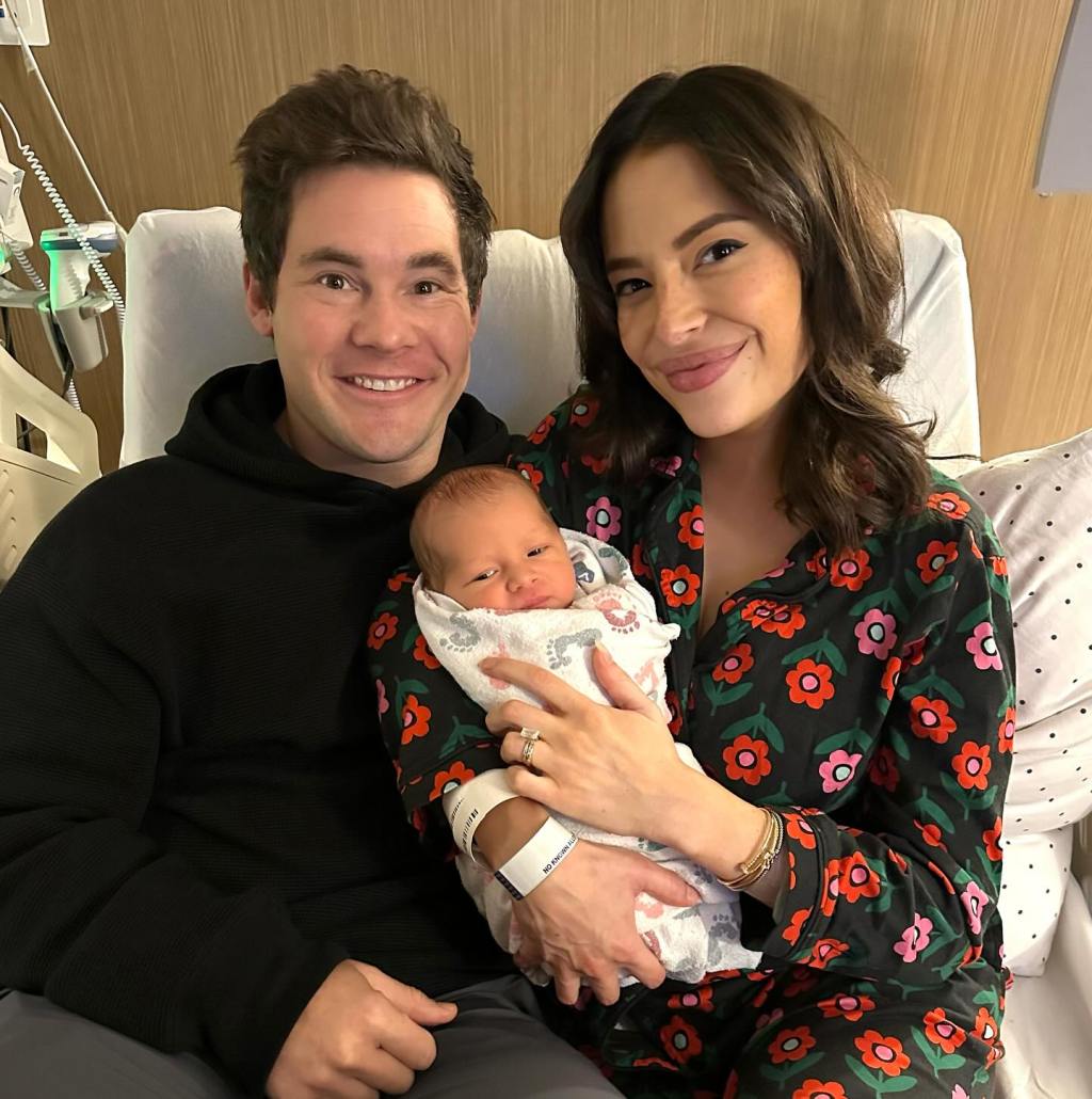 Adam Devine and Chloe Bridges with their newborn